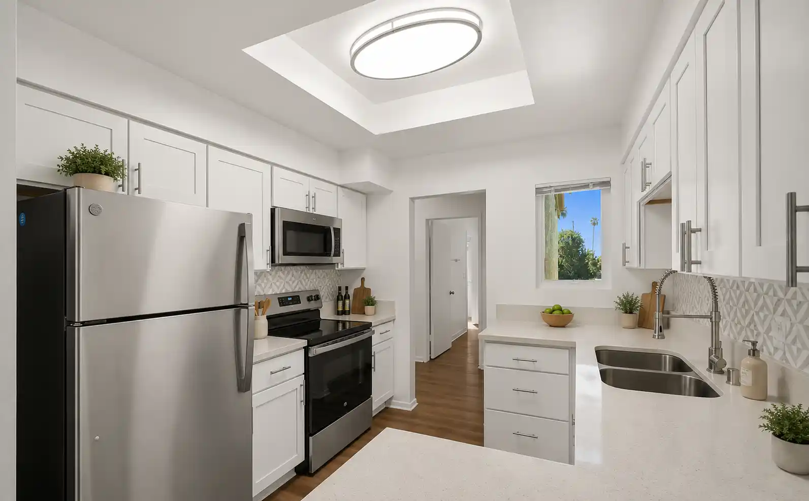 Ashwood Gardens Apartments modern kitchen with stainless steel appliances