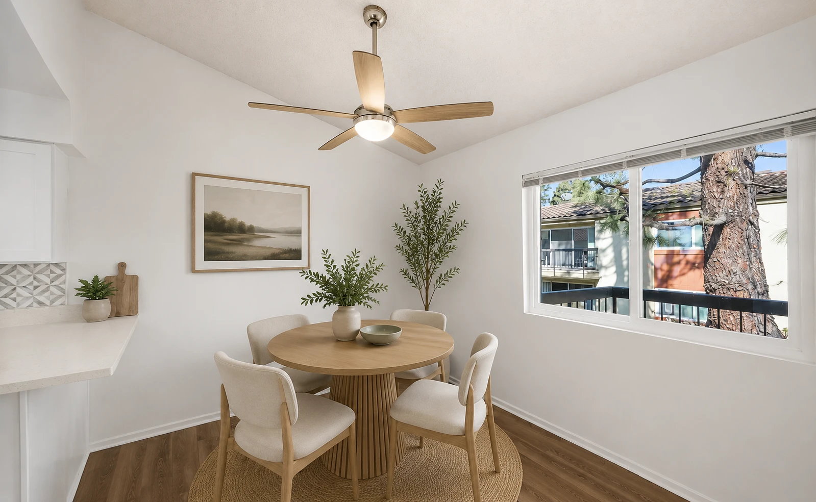 Ashwood Gardens Apartments bright dining nook with ceiling fan